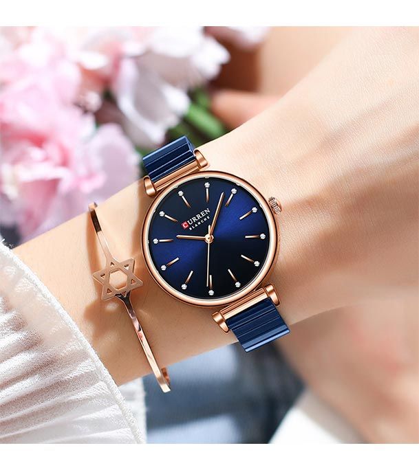 ساعة CURREN Blanche النسائية – أناقة الأزرق الملكي بإطار روز غولد