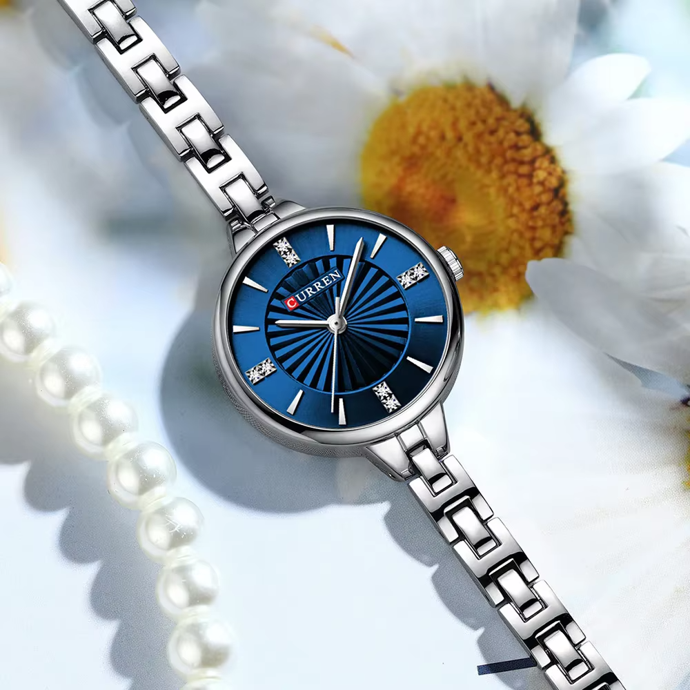 ساعة كورين النسائية الفاخرة باللون الأزرق – Curren Elegant Blue Dial Women’s Watch